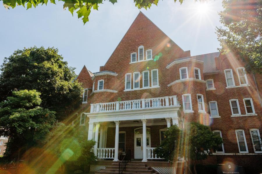 Williston Hall with sunbeams