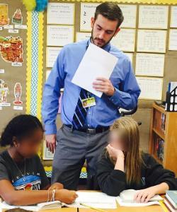  Jon-with-tie-on-and-teaching-in-classroom