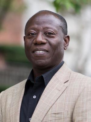 A black man smiles
