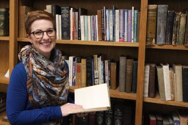 woman holding a book