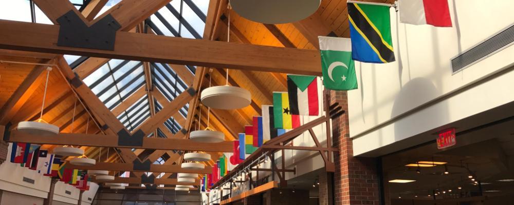 flags hanging in the dining hall at Wheaton College