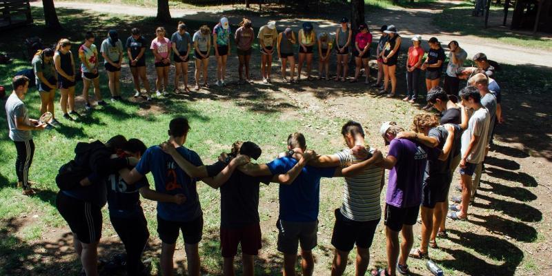 group of staff in circle at honeyrock