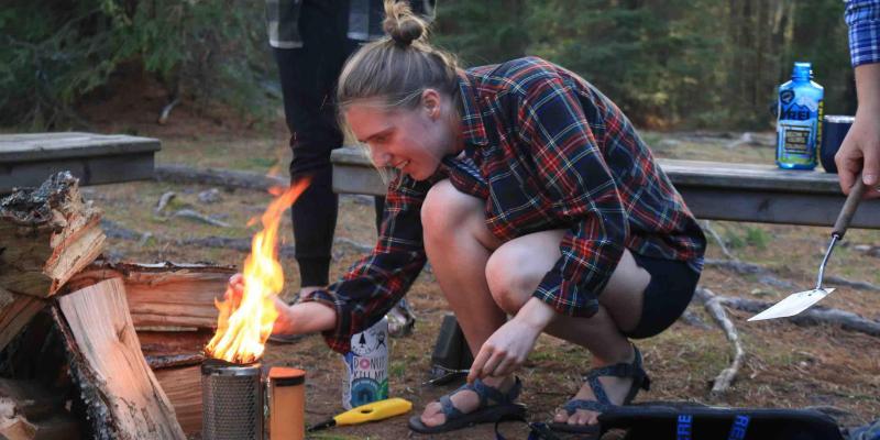 olivia works with a stove on trip