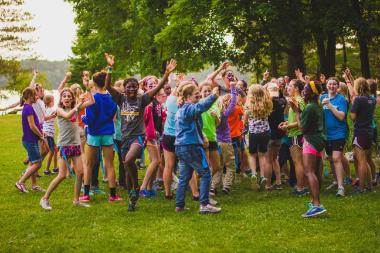 residential camp girls celebrating at honeyrock