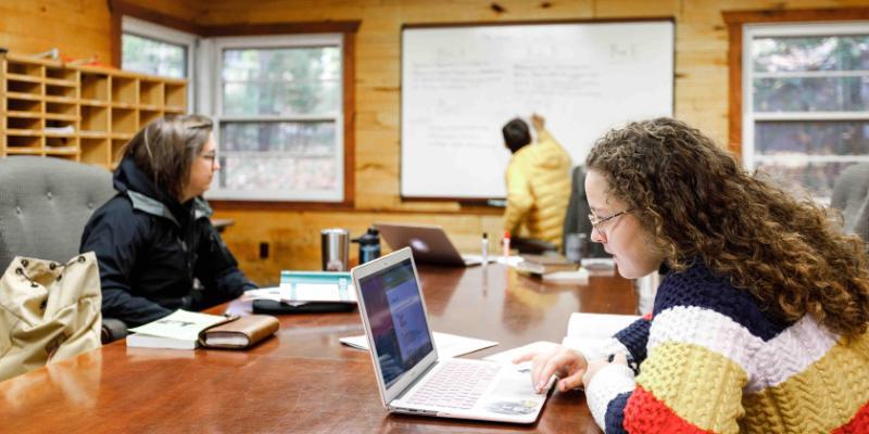 graduate students collaborating at honeyrock