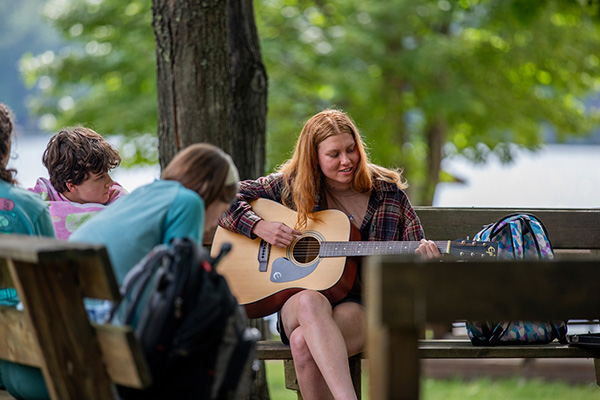 A girl playing guitar