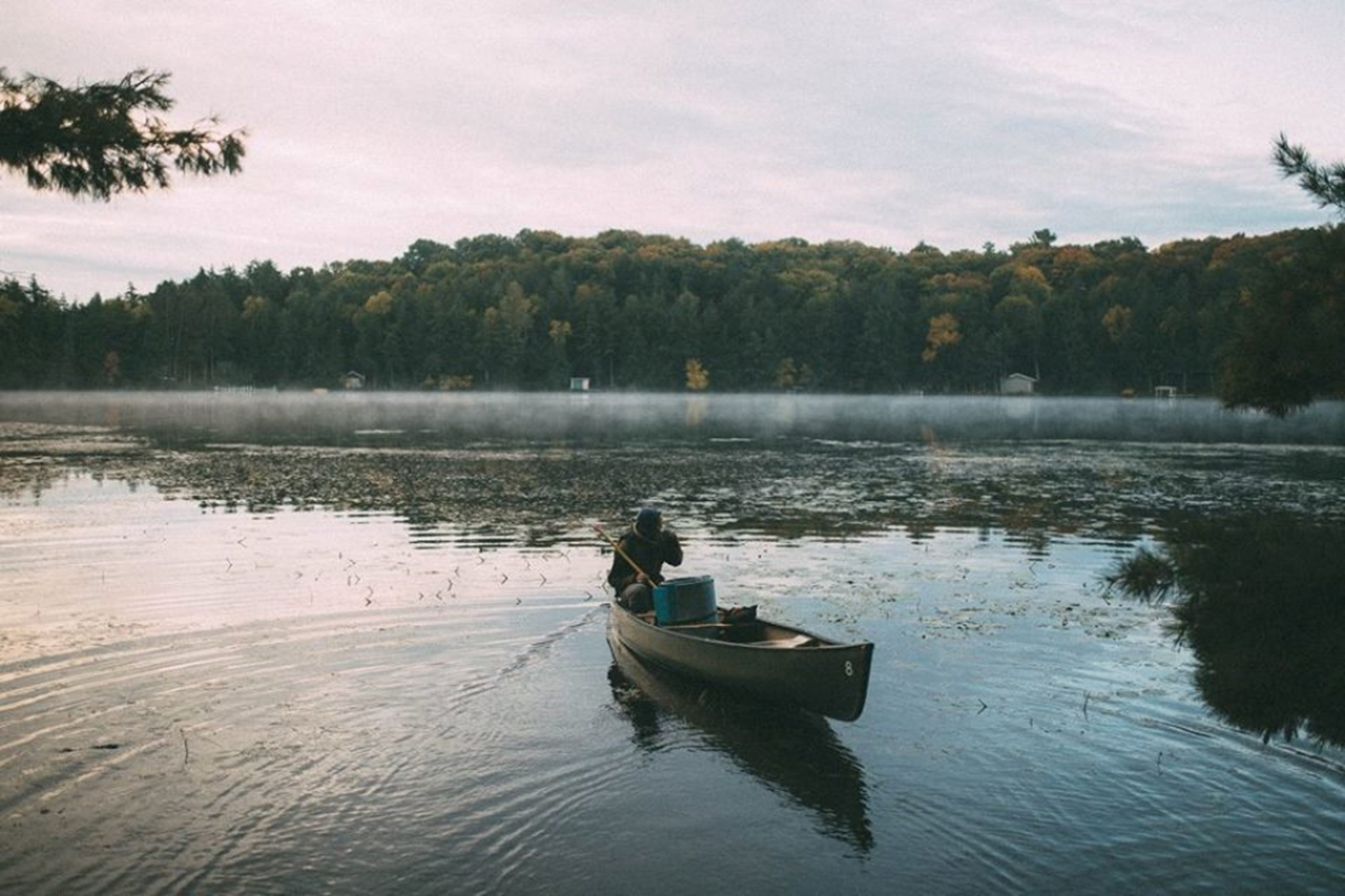 Canoe on the lake Northwoods HoneyRock Wheaton College