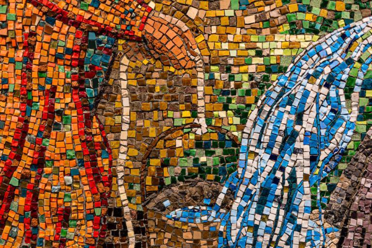 Close up of multicolored mosaic tiles from The Luminous One display at Wheaton College