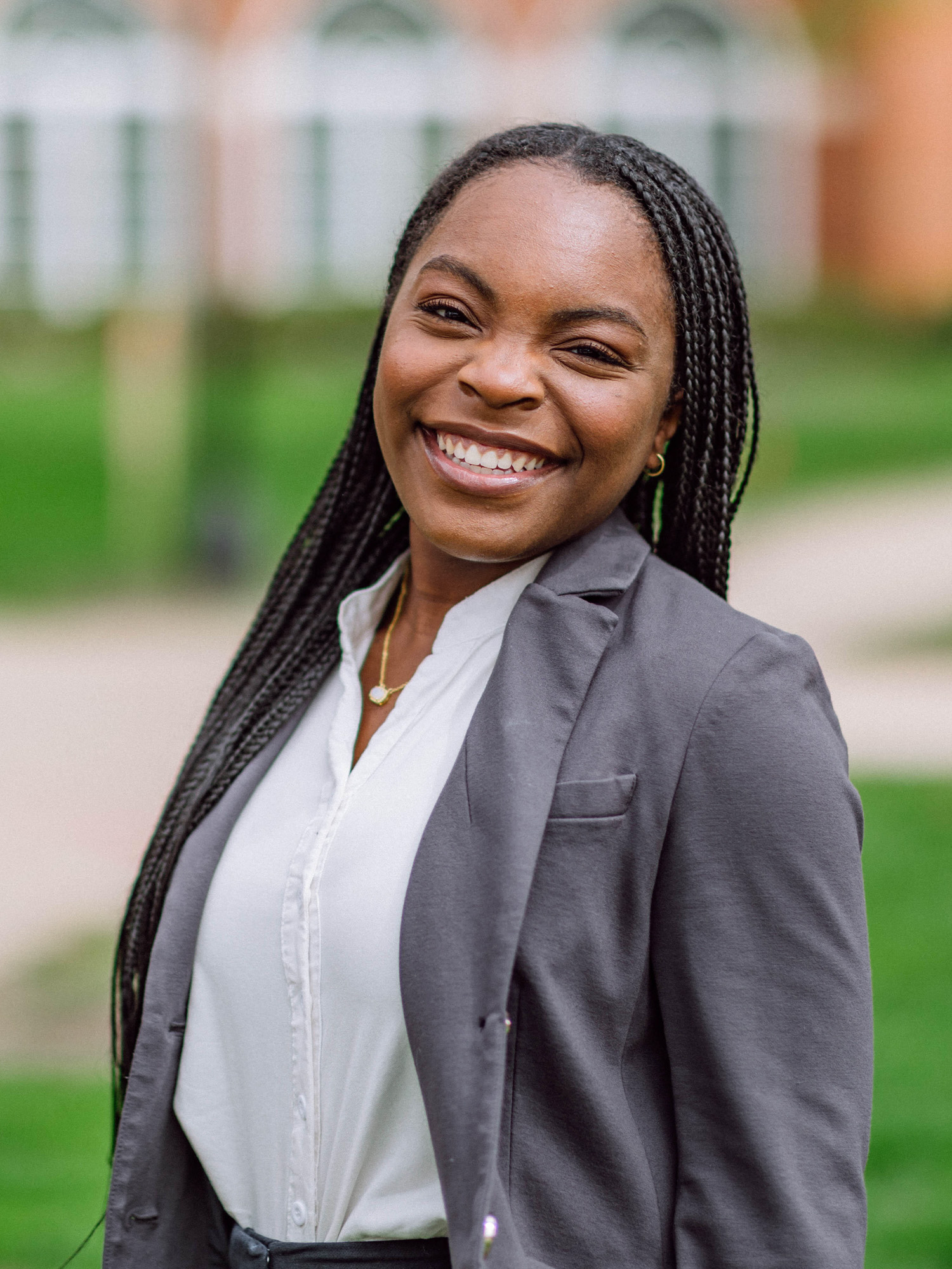 A young black female smiles