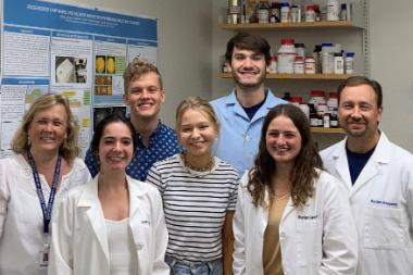 Dan and Lisa Burden and summer research students 380x253