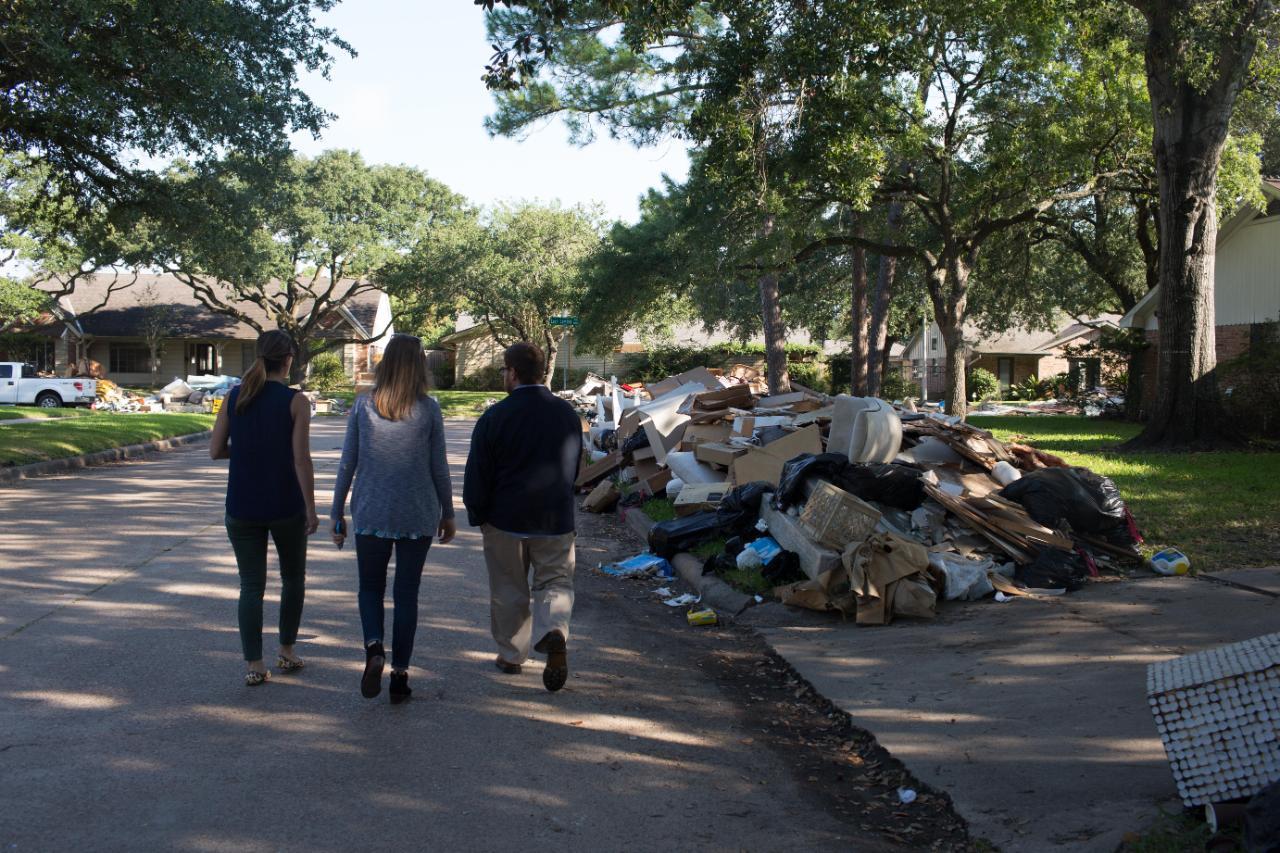 Students in aftermath of Hurricane damage with HDI in Houston