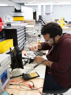 Student in Wheaton College Physics Lab